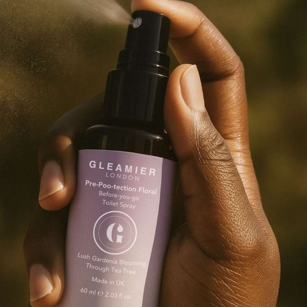 Minimalist product shot of Gleamier before-you-go toilet spray — compact, UK-made floral spray designed for subtle freshness and daily use.